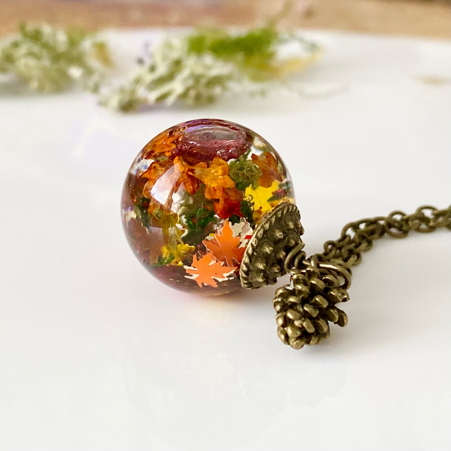 The Autumn Globe – Shaker Necklace with Moss and Pinecone